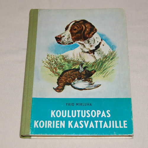 Yrjö Mikluha Koulutusopas koirien kasvattajille